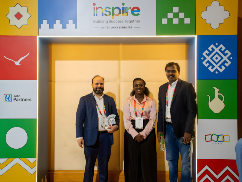Redian Software leadership celebrating Zoho Key Business Contributor award win at Zoho Inspire MEA 2026 conference in Dubai with team members